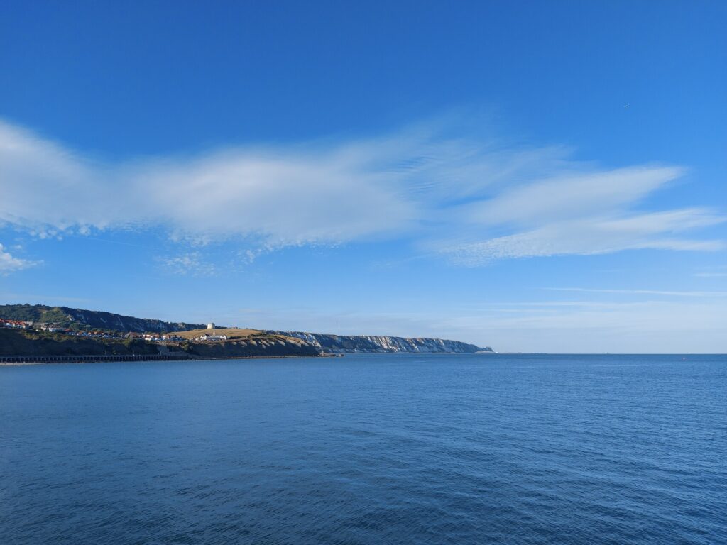 a picture of the white cliffs at Folkstone, view from the Folkstone Harbour Arm